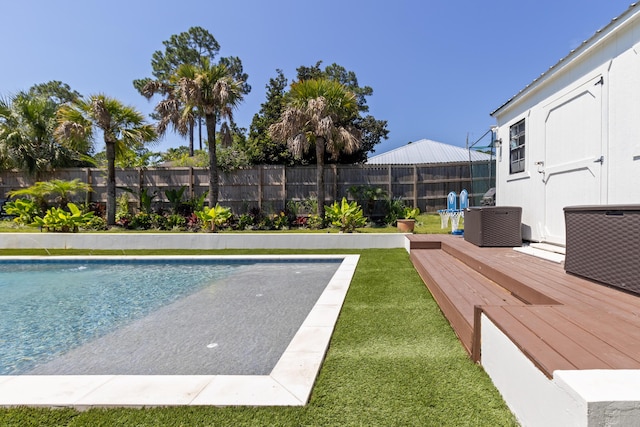 1009 Forest Shore Dr, Miramar Beach, FL 32550 - view of swimming pool with a wooden deck and a fenced backyard