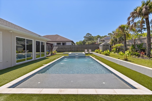 1009 Forest Shore Dr, Miramar Beach, FL 32550 - view of swimming pool with a storage shed, an in-ground hot tub, and a fenced backyard