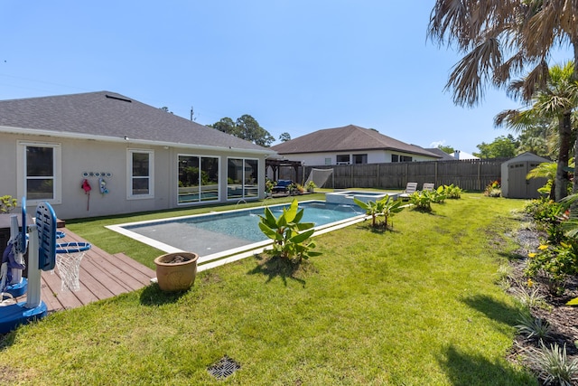 1009 Forest Shore Dr, Miramar Beach, FL 32550 - view of pool with a shed, a fenced backyard, and a deck