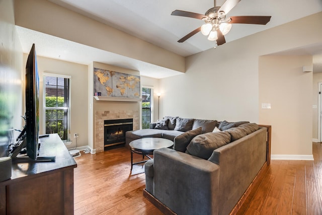 2808 Ping Ln, Crestview, FL 32539 - living room with ceiling fan, plenty of natural light, hardwood / wood-style flooring, and a tile fireplace