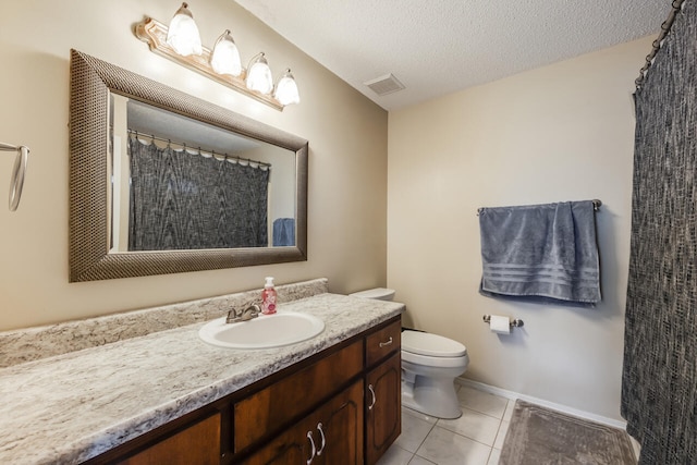 2808 Ping Ln, Crestview, FL 32539 - bathroom with vanity, tile patterned floors, a textured ceiling, and a shower with shower curtain