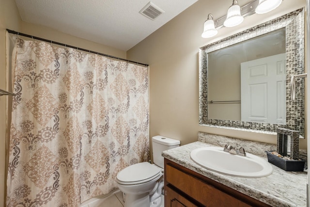 2808 Ping Ln, Crestview, FL 32539 - full bathroom with vanity, a textured ceiling, tile patterned floors, and curtained shower