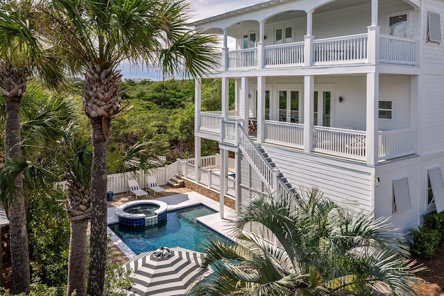 65 Sandy Shores Ct, Inlet Beach, FL 32461 - view of swimming pool with a pool with connected hot tub and a patio