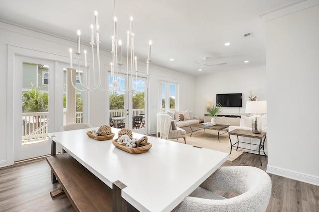 65 Sandy Shores Ct, Inlet Beach, FL 32461 - dining area featuring french doors, crown molding, recessed lighting, wood finished floors, and ceiling fan