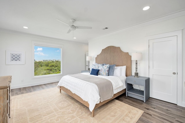65 Sandy Shores Ct, Inlet Beach, FL 32461 - bedroom featuring ornamental molding, wood finished floors, recessed lighting, and a ceiling fan