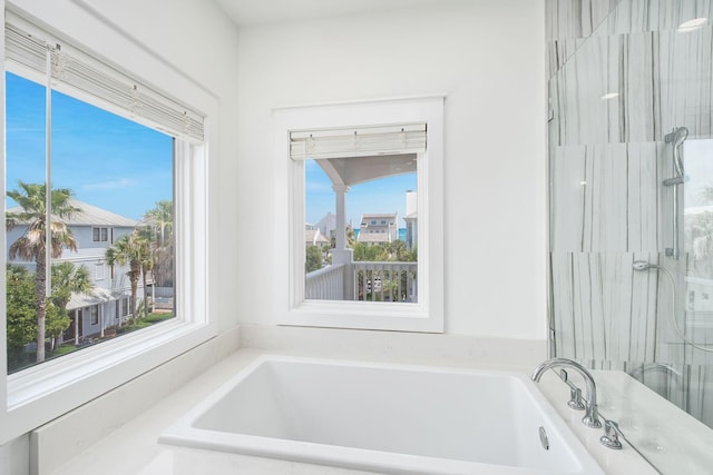 65 Sandy Shores Ct, Inlet Beach, FL 32461 - bathroom featuring a bathtub and a shower with door
