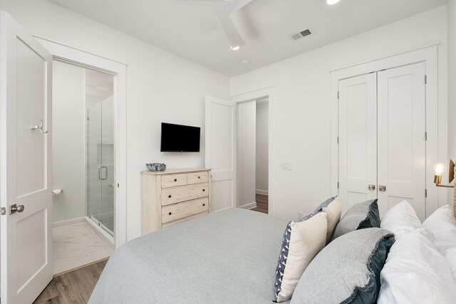 65 Sandy Shores Ct, Inlet Beach, FL 32461 - bedroom featuring a closet, ensuite bathroom, and marble look tile flooring
