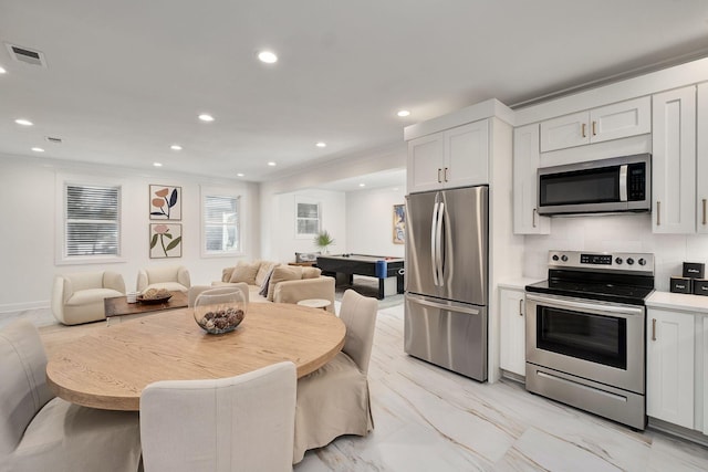 65 Sandy Shores Ct, Inlet Beach, FL 32461 - kitchen featuring stainless steel appliances, open floor plan, recessed lighting, pool table, and ornamental molding