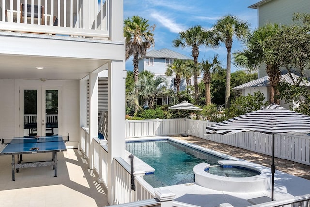 65 Sandy Shores Ct, Inlet Beach, FL 32461 - view of pool featuring french doors, a pool with connected hot tub, and a patio area