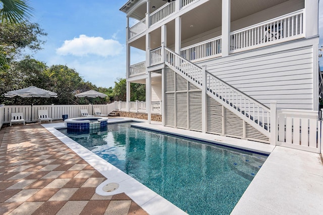 65 Sandy Shores Ct, Inlet Beach, FL 32461 - view of pool featuring stairway, a pool with connected hot tub, and a patio