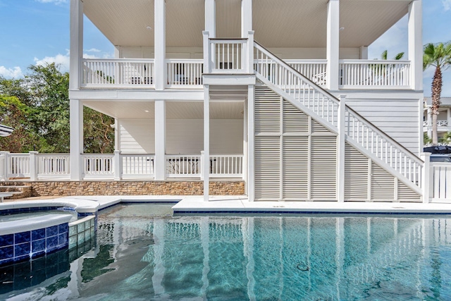 65 Sandy Shores Ct, Inlet Beach, FL 32461 - view of swimming pool featuring stairs and a pool with connected hot tub