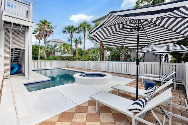 65 Sandy Shores Ct, Inlet Beach, FL 32461 - view of swimming pool with a patio, a pool with connected hot tub, and a fenced backyard