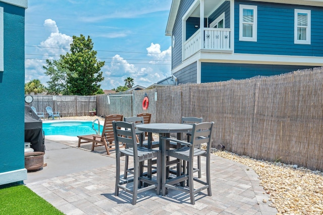 102 Terra Cotta Way, Destin, FL 32541 - fenced backyard featuring a patio and outdoor dining area