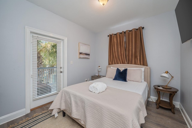 102 Terra Cotta Way, Destin, FL 32541 - bedroom with wood finished floors and access to outside