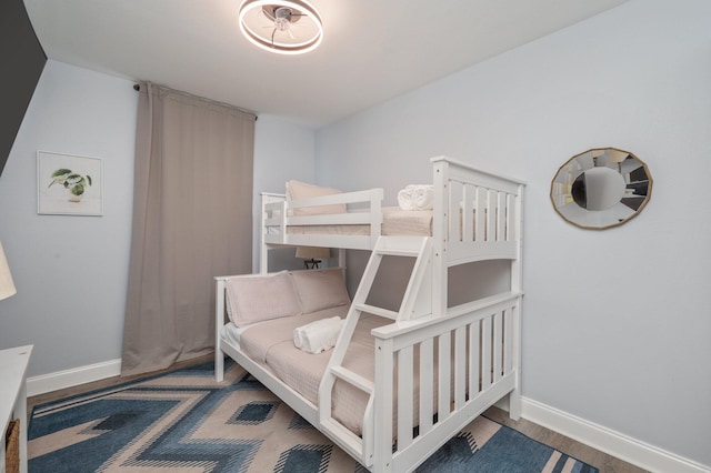 102 Terra Cotta Way, Destin, FL 32541 - bedroom featuring baseboards and wood finished floors
