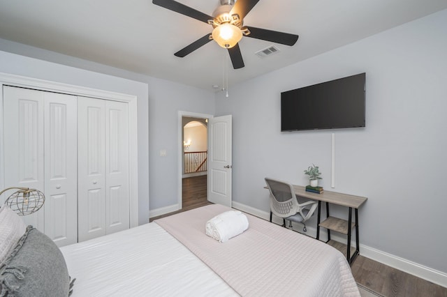 102 Terra Cotta Way, Destin, FL 32541 - bedroom with wood finished floors, a closet, and a ceiling fan