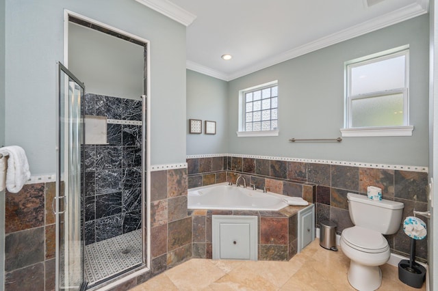 102 Terra Cotta Way, Destin, FL 32541 - bathroom with ornamental molding, a bath, tile walls, a stall shower, and wainscoting