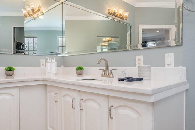 102 Terra Cotta Way, Destin, FL 32541 - bathroom featuring ornamental molding, a chandelier, and vanity
