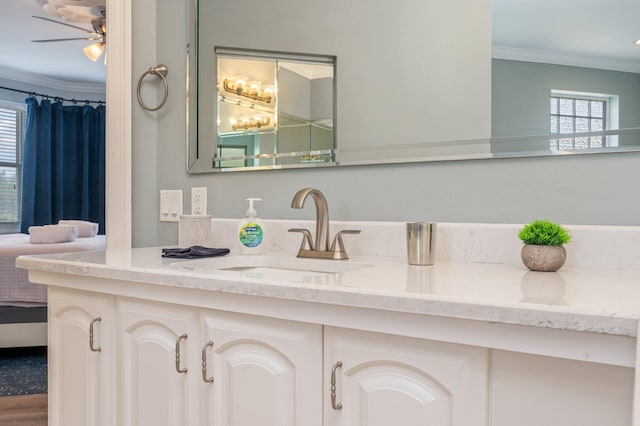 102 Terra Cotta Way, Destin, FL 32541 - bathroom with ornamental molding, vanity, and a ceiling fan