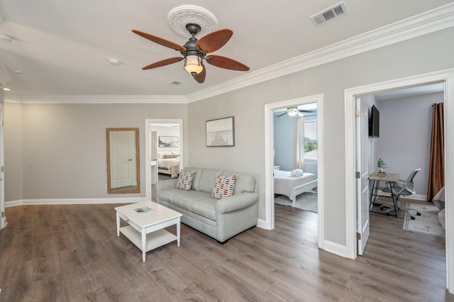 102 Terra Cotta Way, Destin, FL 32541 - living room with a ceiling fan, crown molding, and wood finished floors