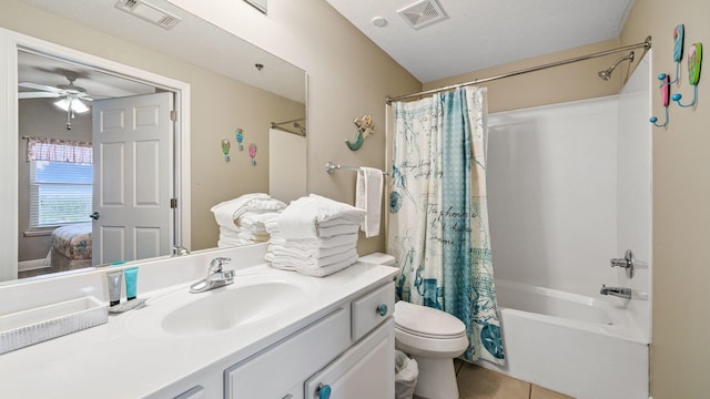 122 Seascape Dr Unit 902, Miramar Beach, FL 32550 - ensuite bathroom featuring shower / bath combo with shower curtain, vanity, tile patterned floors, and ceiling fan