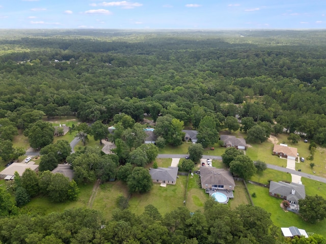 48 S Pleasant Dr, Defuniak Springs, FL 32435 - aerial perspective of suburban area with a heavily wooded area