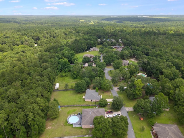 48 S Pleasant Dr, Defuniak Springs, FL 32435 - aerial view of property and surrounding area featuring a forest