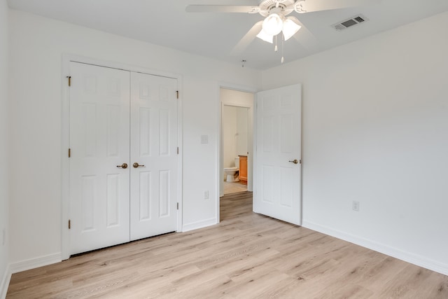 48 S Pleasant Dr, Defuniak Springs, FL 32435 - unfurnished bedroom featuring light wood-type flooring, a closet, and ceiling fan