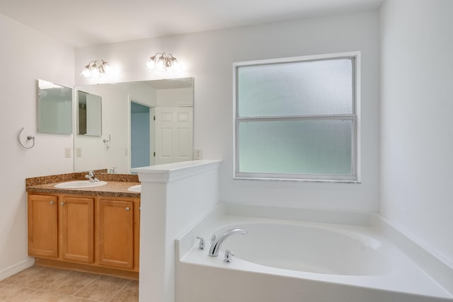 48 S Pleasant Dr, Defuniak Springs, FL 32435 - full bath featuring vanity, a garden tub, and tile patterned floors