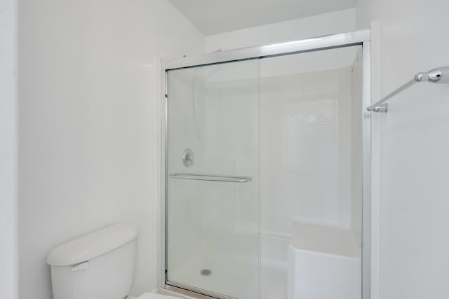 48 S Pleasant Dr, Defuniak Springs, FL 32435 - bathroom with a stall shower and toilet