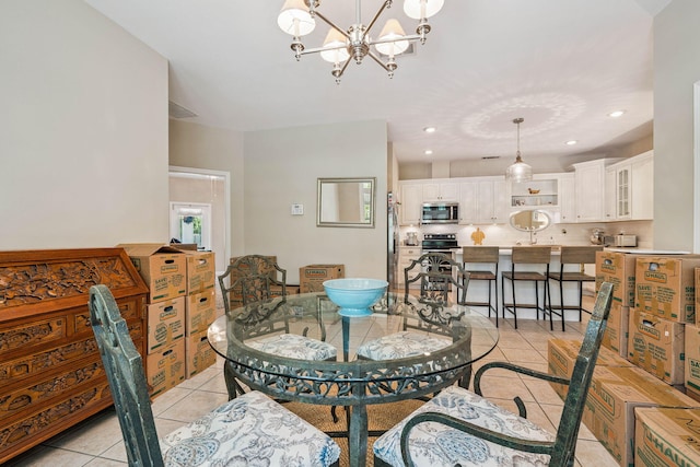 172 Shady Ln, Freeport, FL 32439 - dining area featuring light tile patterned flooring, a chandelier, and recessed lighting