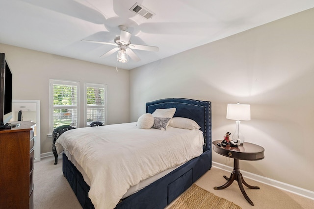 172 Shady Ln, Freeport, FL 32439 - bedroom with light carpet and a ceiling fan