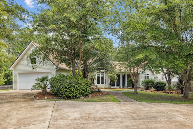172 Shady Ln, Freeport, FL 32439 - view of property hidden behind natural elements with driveway and a garage
