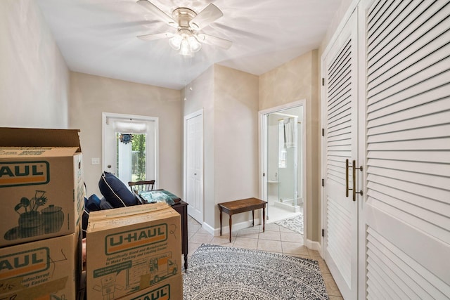 172 Shady Ln, Freeport, FL 32439 - bedroom featuring light tile patterned floors and ensuite bath