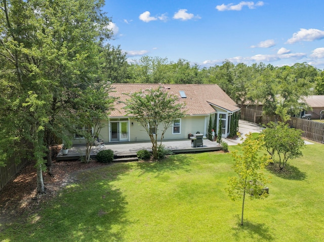 172 Shady Ln, Freeport, FL 32439 - rear view of property featuring a wooden deck and french doors