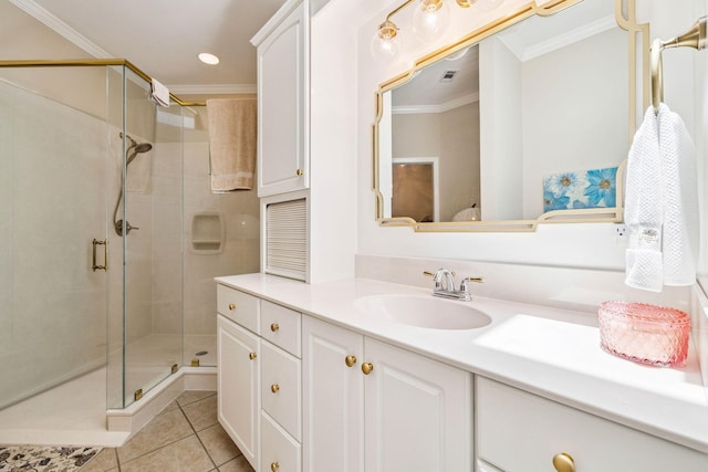 172 Shady Ln, Freeport, FL 32439 - bathroom with a stall shower, vanity, tile patterned flooring, ornamental molding, and recessed lighting