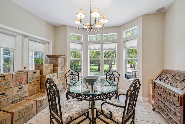172 Shady Ln, Freeport, FL 32439 - dining room featuring light tile patterned floors and a chandelier