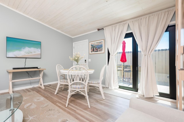 17462 Front Beach Rd Unit 18C, Panama City Beach, FL 32413 - dining room with crown molding, wood finished floors, and wooden ceiling