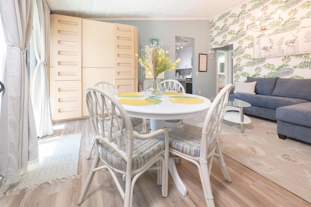 17462 Front Beach Rd Unit 18C, Panama City Beach, FL 32413 - dining space featuring light wood-style flooring