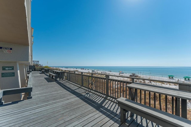 955 Scenic Gulf Dr Unit 410, Miramar Beach, FL 32550 - wooden deck with view of water and beach