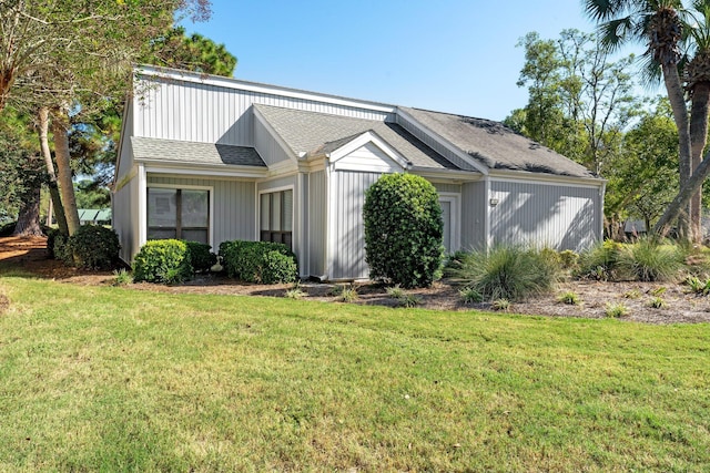 727 Sandpiper Pl # 10516, Miramar Beach, FL 32550 - view of front of house featuring a front yard and a shingled roof