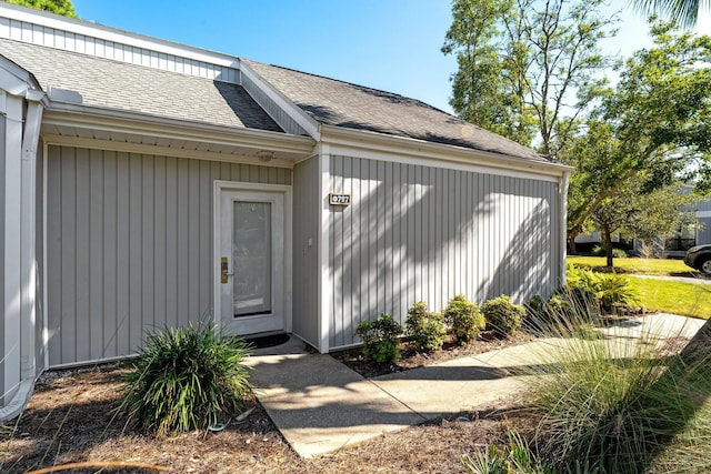 727 Sandpiper Pl # 10516, Miramar Beach, FL 32550 - doorway to property featuring roof with shingles