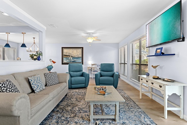 727 Sandpiper Pl # 10516, Miramar Beach, FL 32550 - living room with ceiling fan and light wood-type flooring