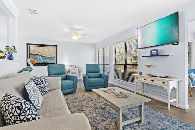 727 Sandpiper Pl # 10516, Miramar Beach, FL 32550 - living area featuring a ceiling fan and wood finished floors
