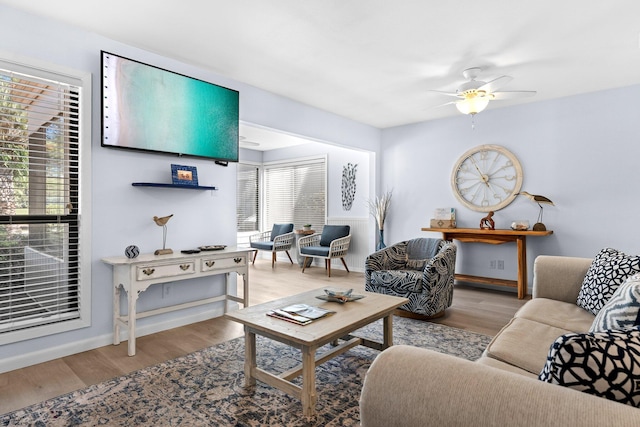 727 Sandpiper Pl # 10516, Miramar Beach, FL 32550 - living area with a ceiling fan and wood finished floors