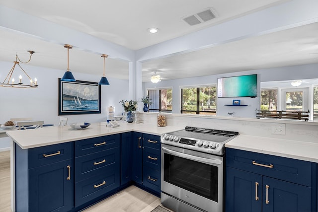 727 Sandpiper Pl # 10516, Miramar Beach, FL 32550 - kitchen with stainless steel range with electric cooktop, ceiling fan, light wood finished floors, blue cabinets, and pendant lighting