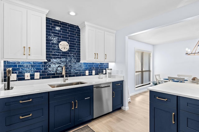727 Sandpiper Pl # 10516, Miramar Beach, FL 32550 - kitchen featuring dishwasher, blue cabinetry, white cabinets, light wood-style flooring, and recessed lighting