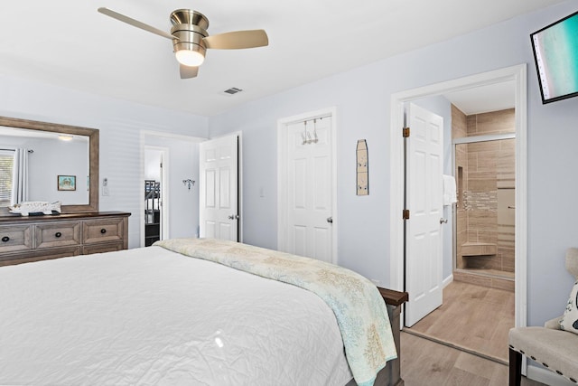727 Sandpiper Pl # 10516, Miramar Beach, FL 32550 - bedroom featuring light wood-style flooring, ceiling fan, and ensuite bathroom