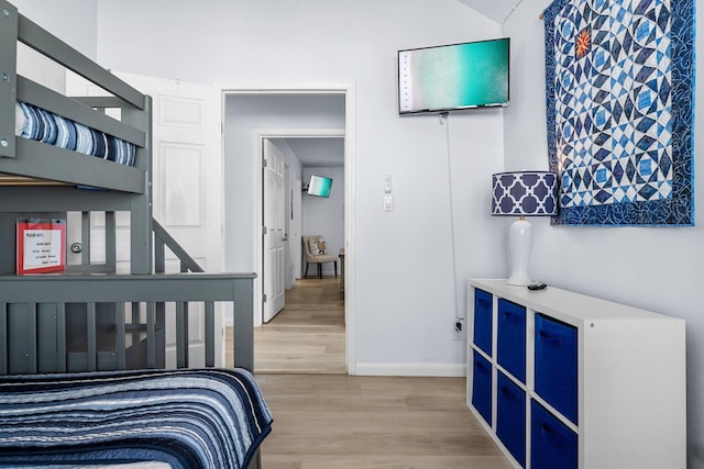 727 Sandpiper Pl # 10516, Miramar Beach, FL 32550 - bedroom featuring baseboards and light wood-style flooring
