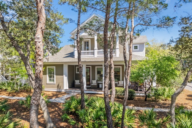 9 W Salt Box Ln, Watersound, FL 32461 - view of front of property with covered porch, a balcony, and a shingled roof